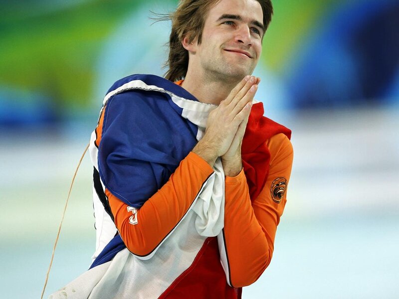 Man in Orange and Blue Suit