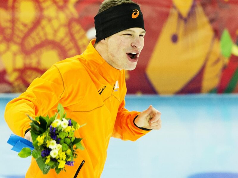 Man in Orange Jacket — Celebratory, Photograph