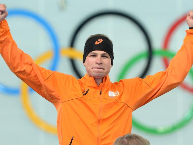 Man in Orange Jacket — Celebratory