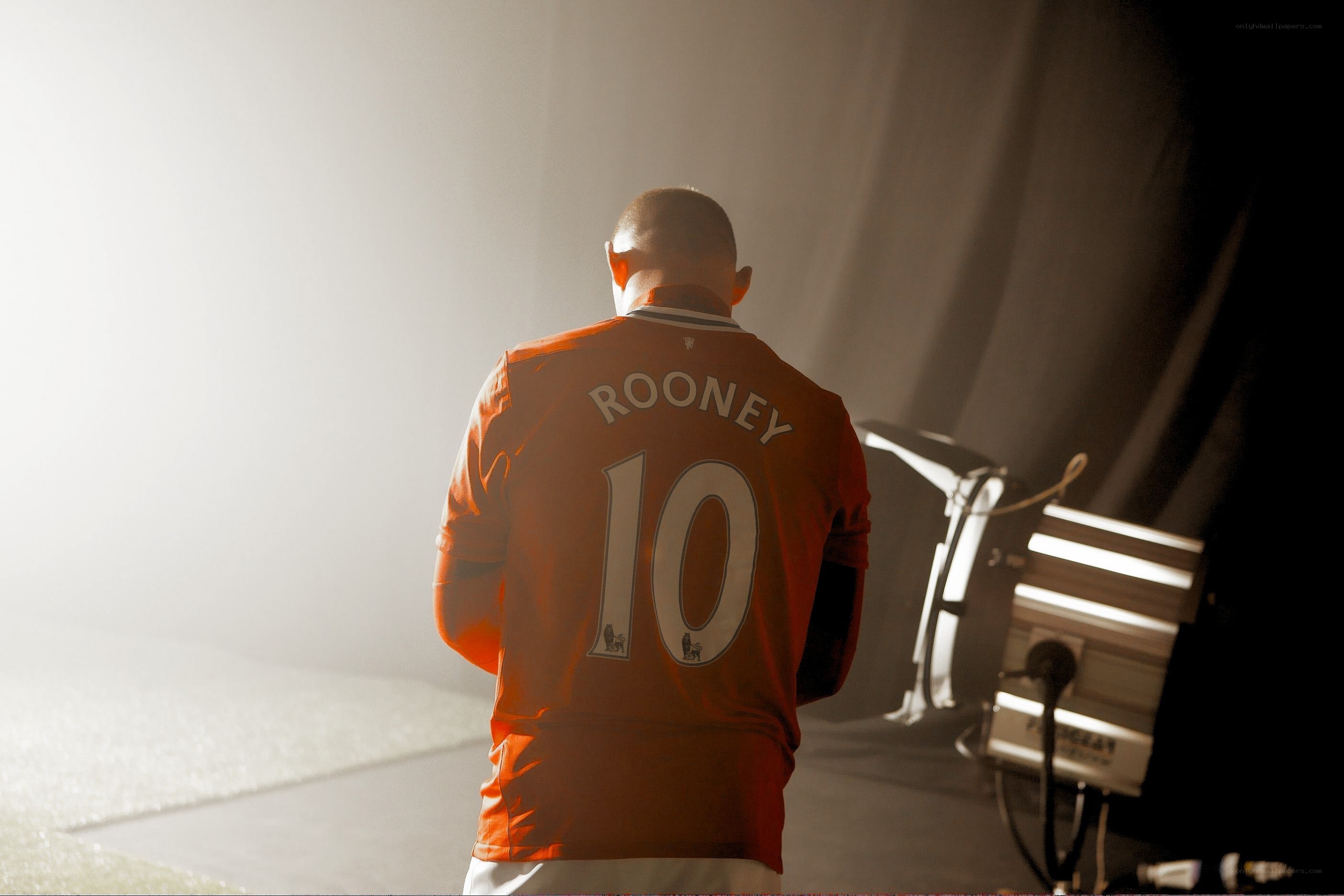 Man in orange jersey