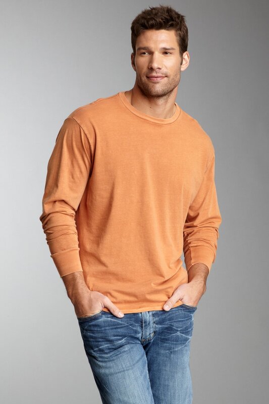 man in orange long-sleeve shirt