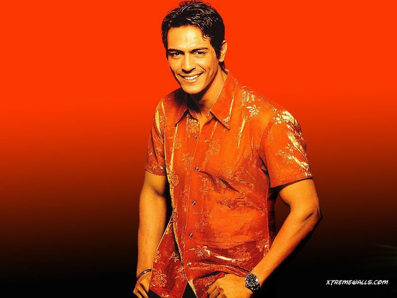 Man in Orange Shirt — Red, Confident