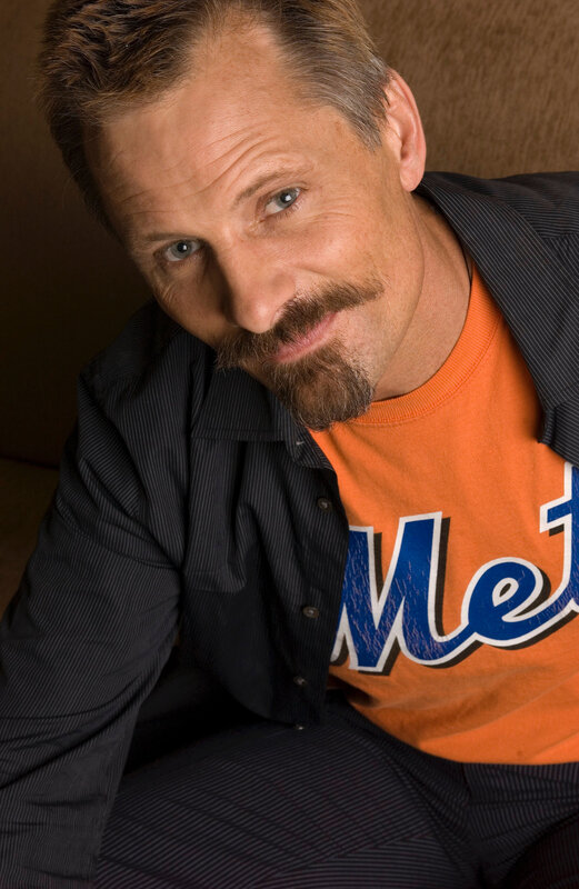 man in orange t-shirt