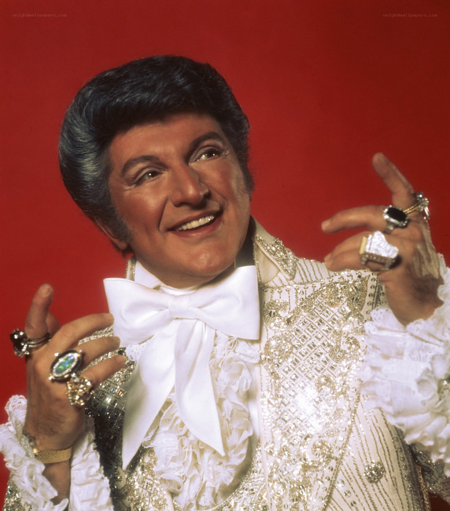 Man in ornate white suit