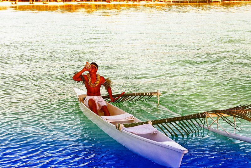 Man in Outrigger Canoe — Blue, Serene