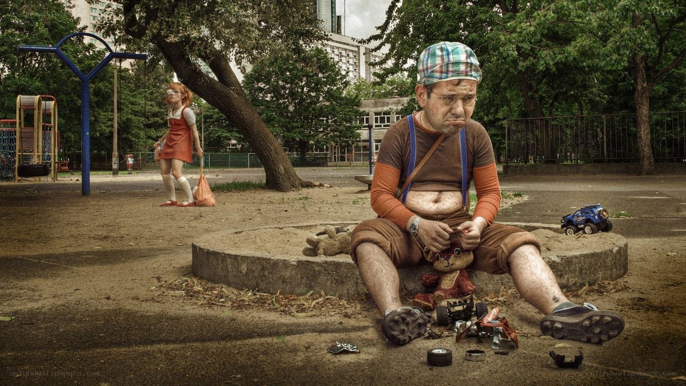 Man in park with toys