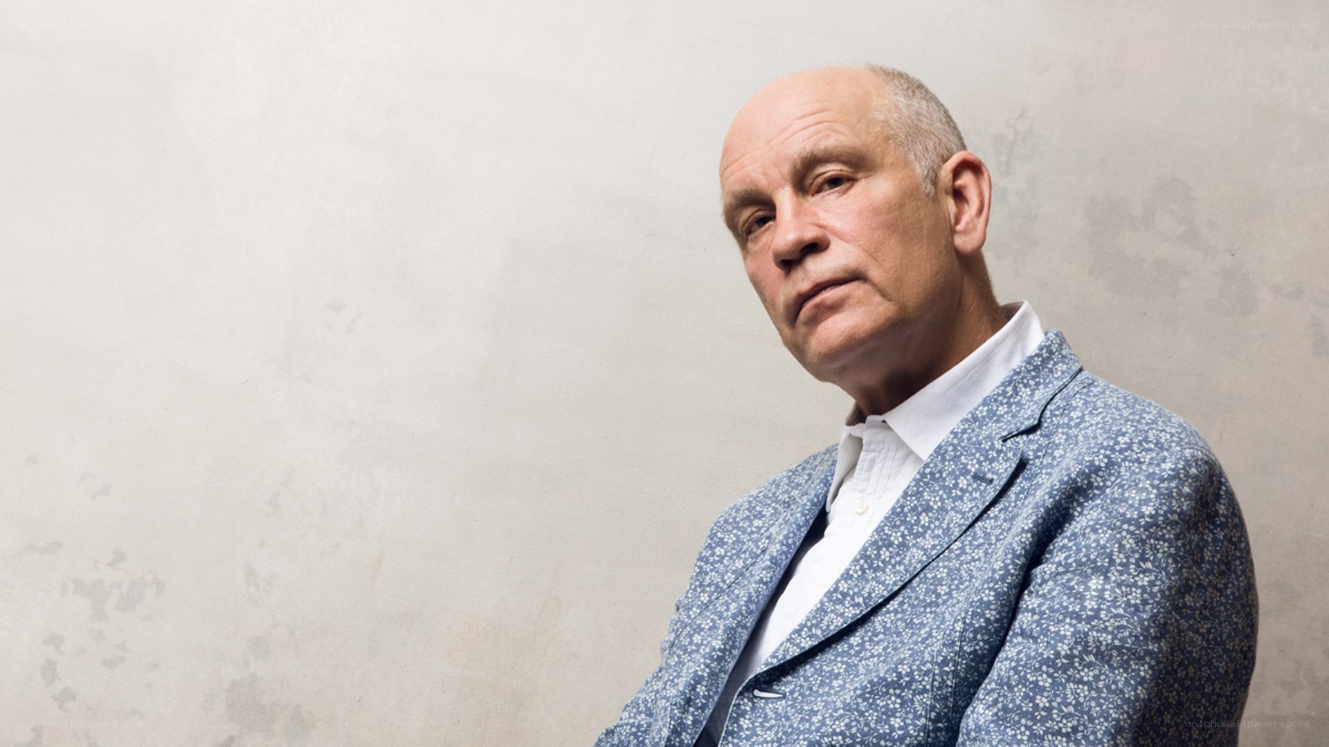 man in patterned blazer