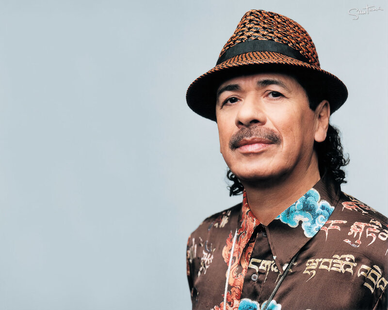 Man in patterned hat and shirt