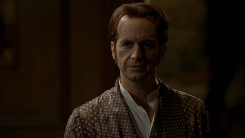 man in patterned robe