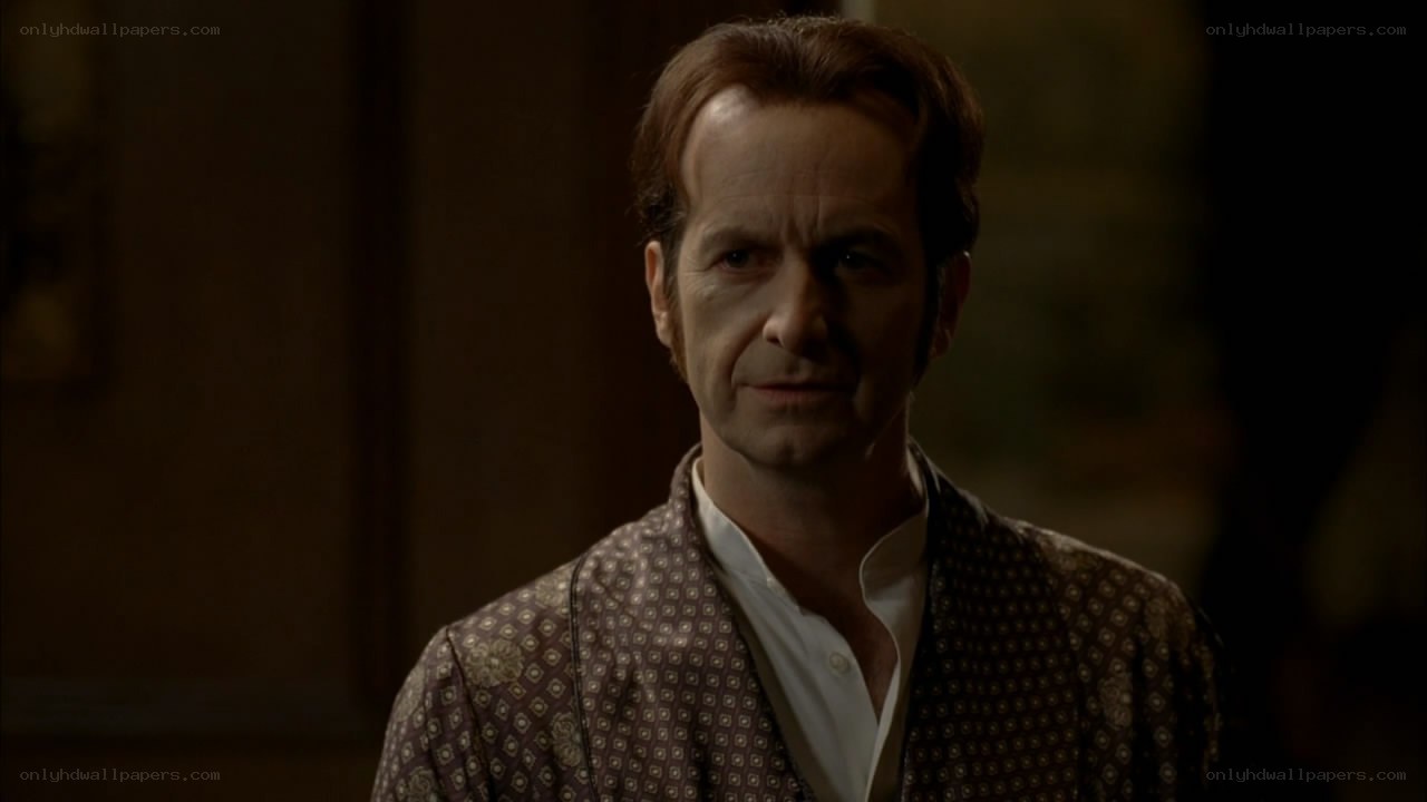 man in patterned robe