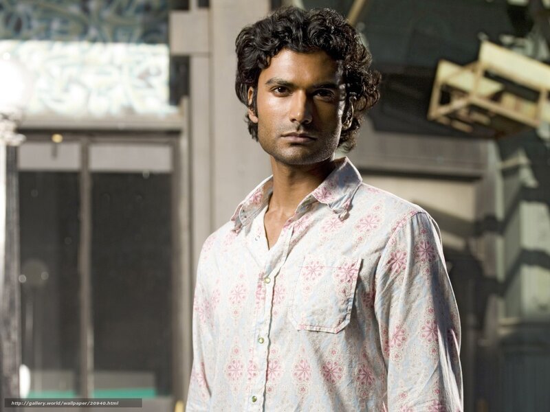 man in patterned shirt