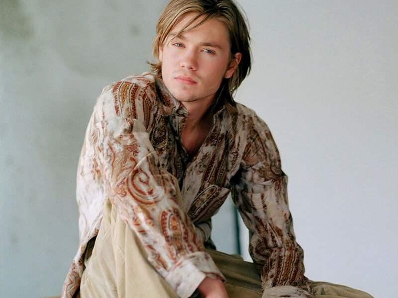 man in patterned shirt