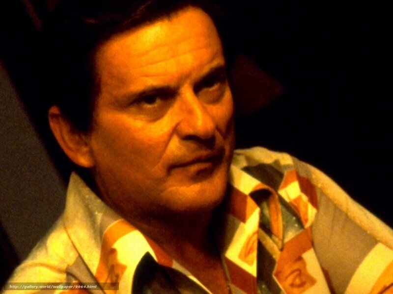 man in patterned shirt