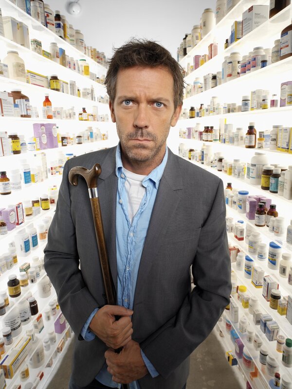 Man in pharmacy with cane