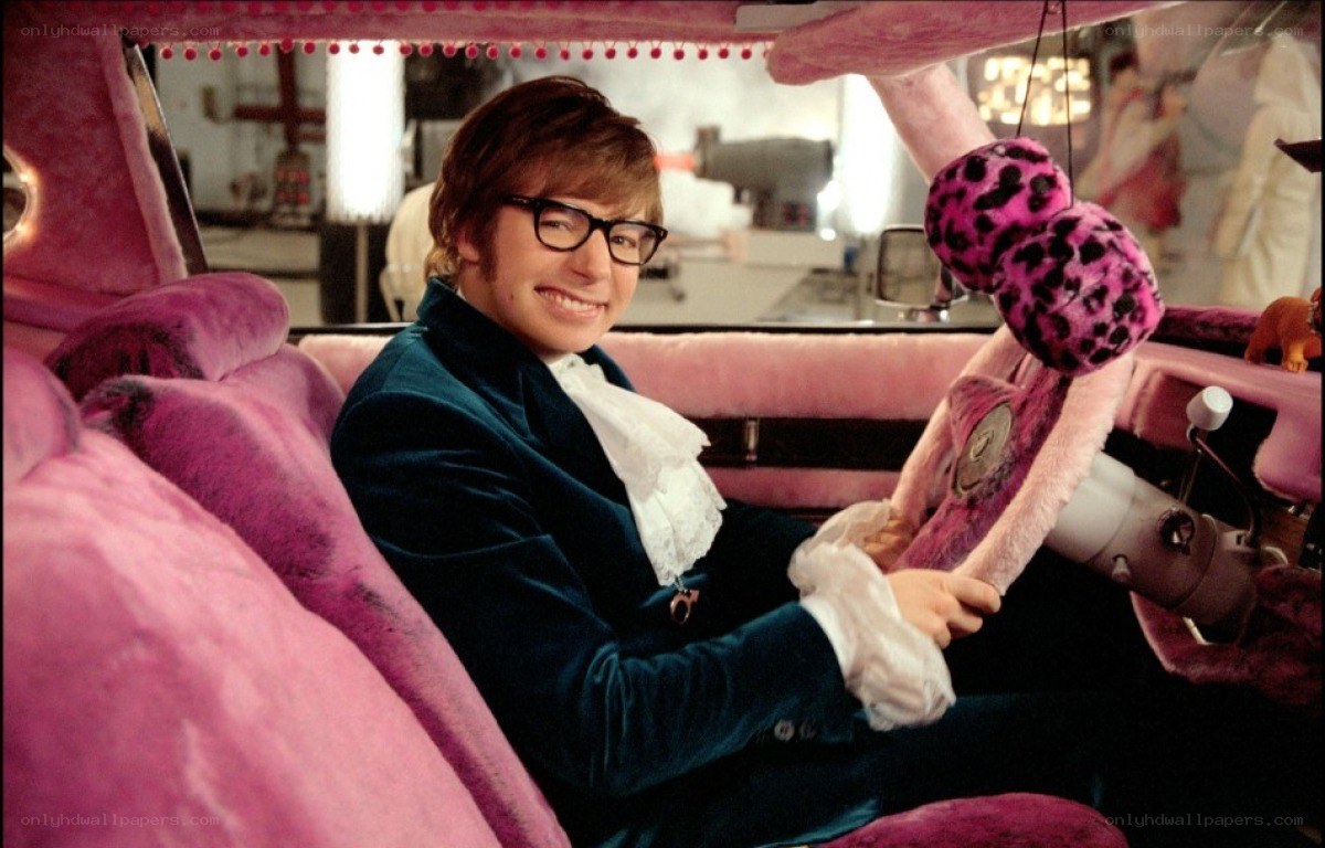 man in pink car interior