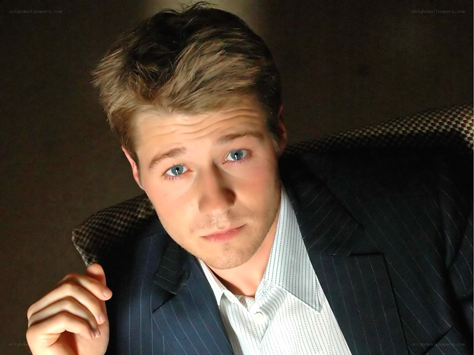 man in pinstripe suit