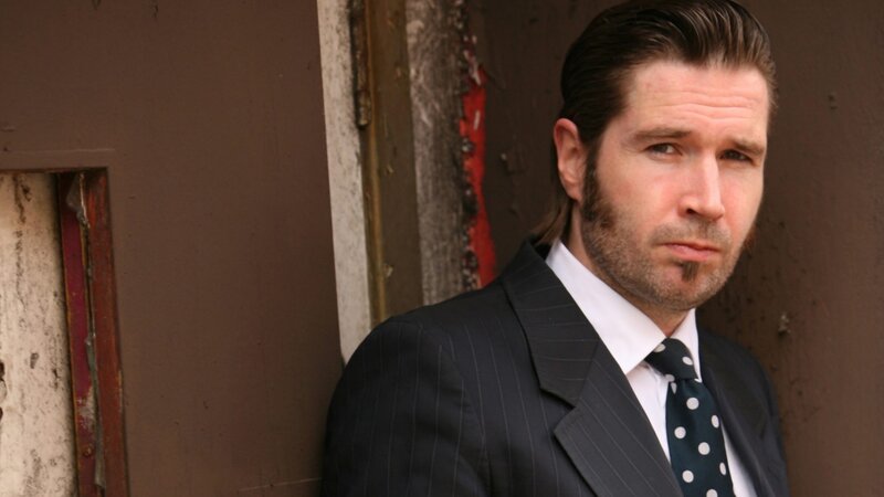 man in pinstripe suit