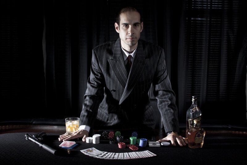 Man in pinstripe suit at poker table