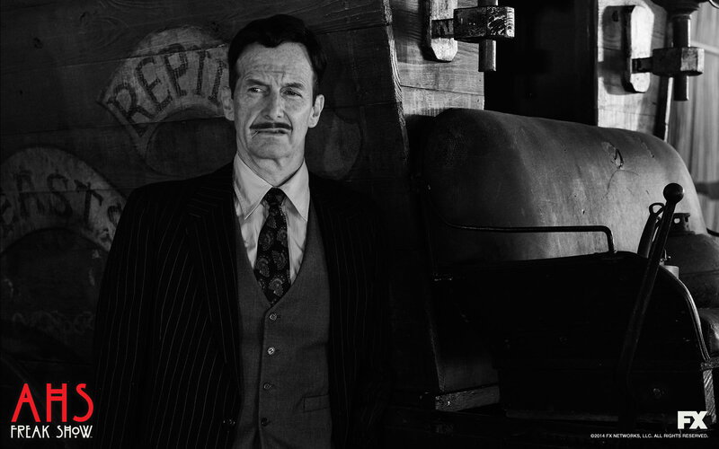 Man in Pinstripe Suit — Black, Dramatic, Photograph, Wooden Wall