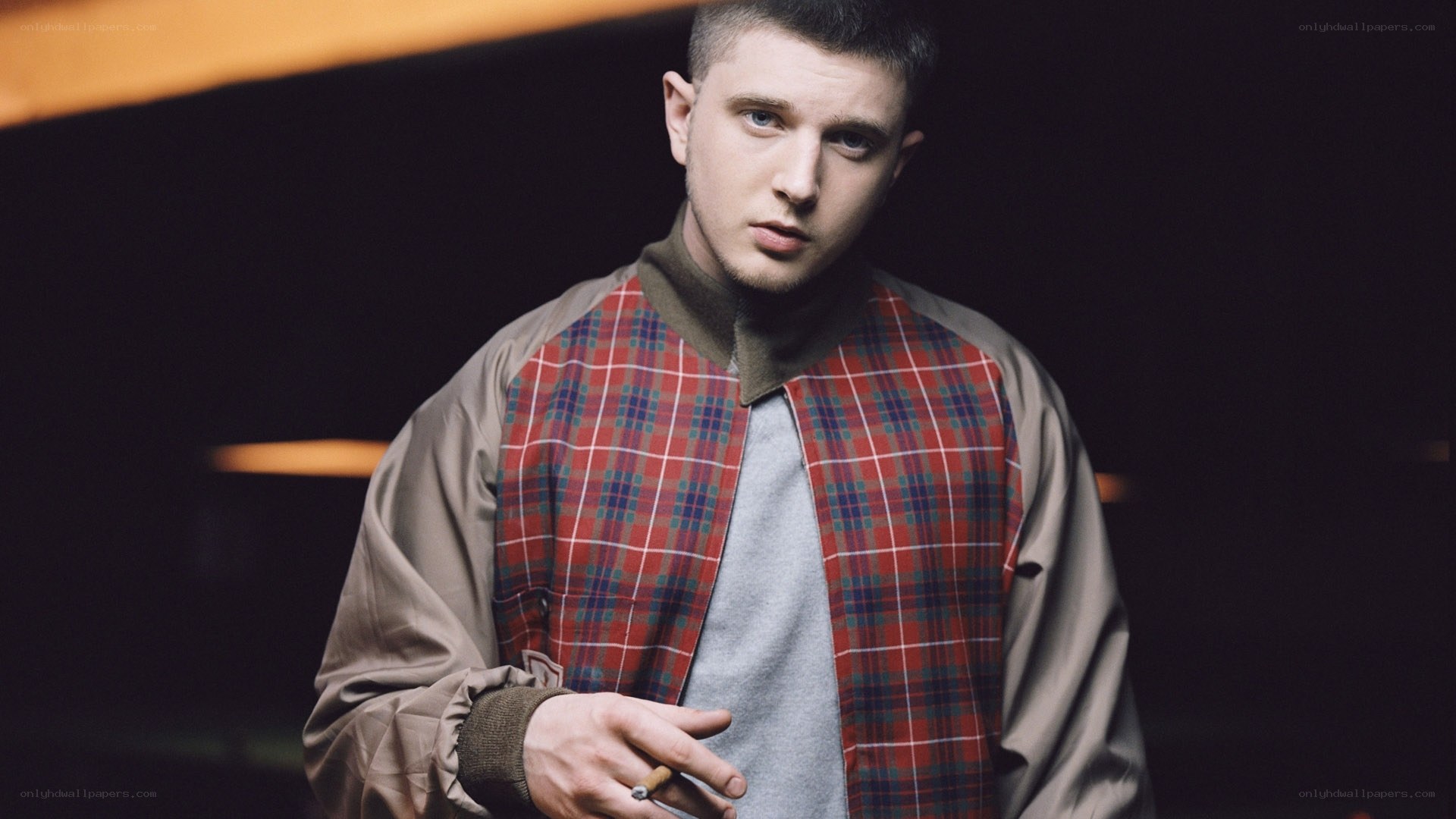 man in plaid jacket