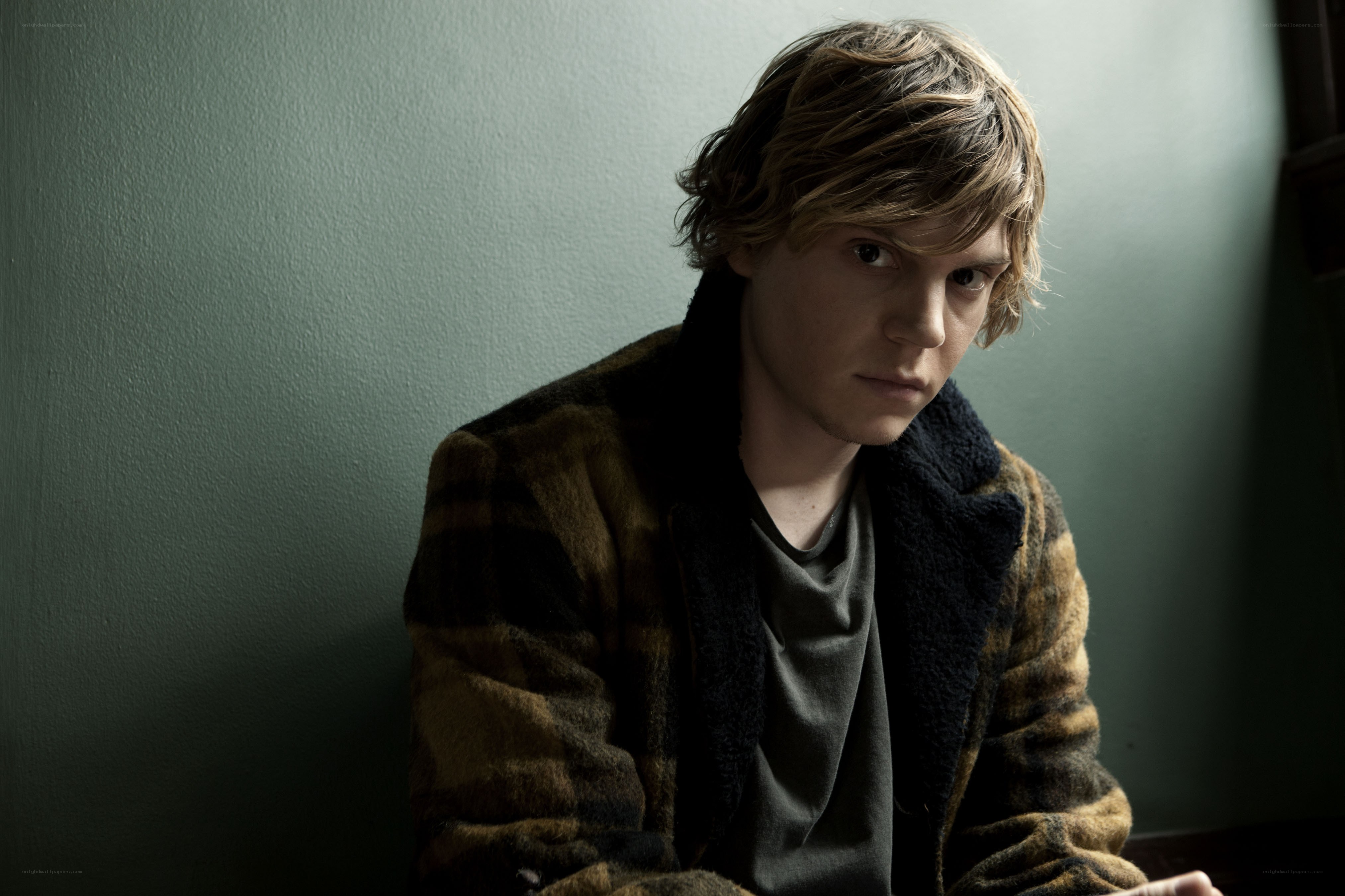 man in plaid jacket