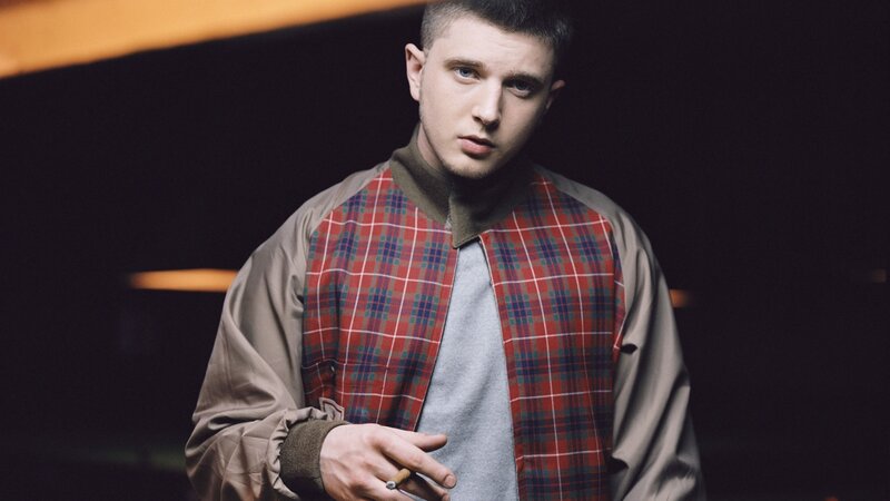 Man in Plaid Jacket — Black, Dramatic