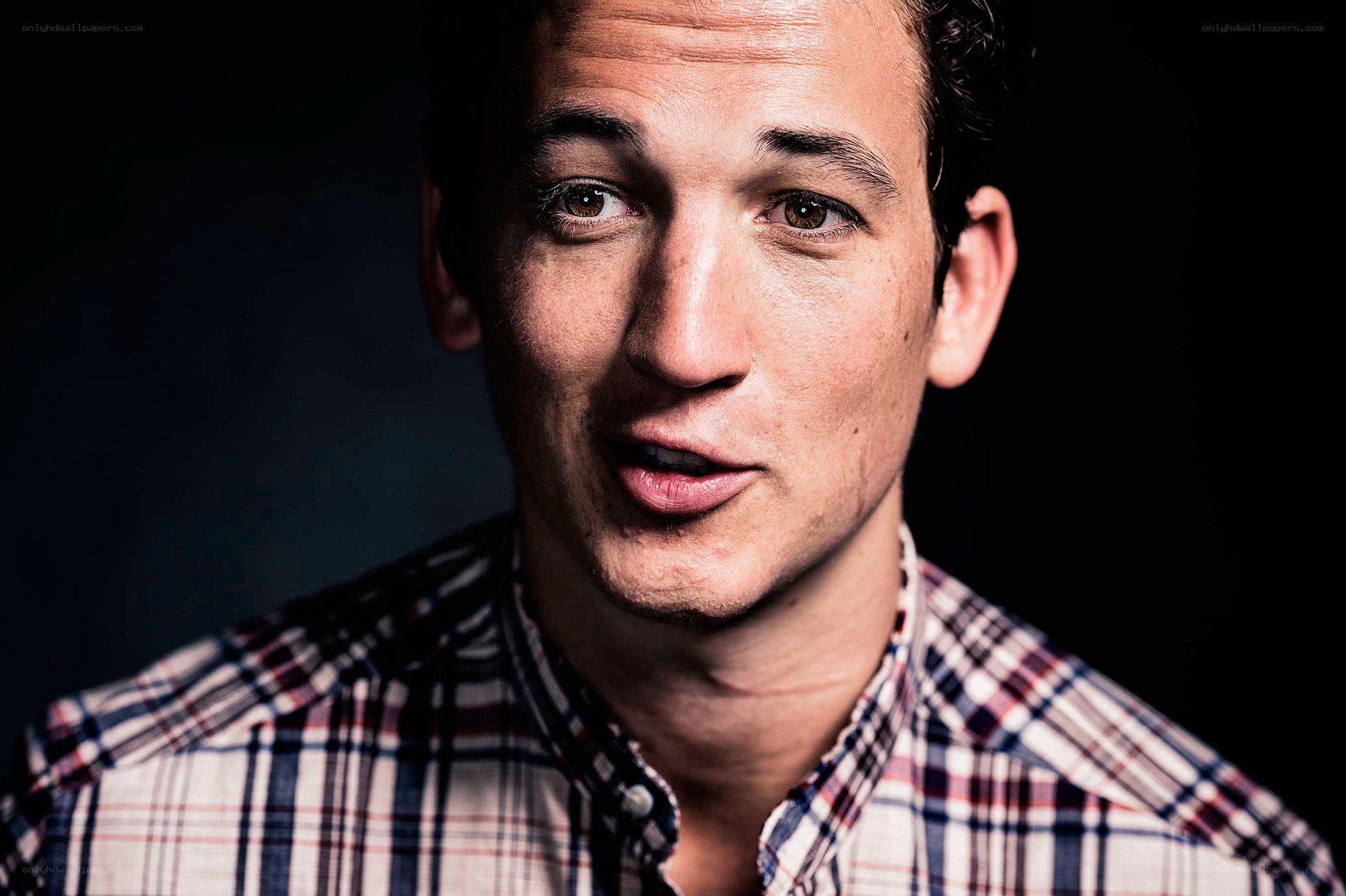 man in plaid shirt