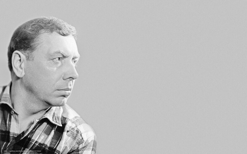 Man in Plaid Shirt — Black, Serious