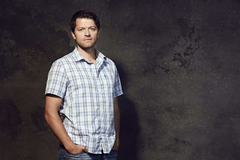 Man in Plaid Shirt — Blue, Serious