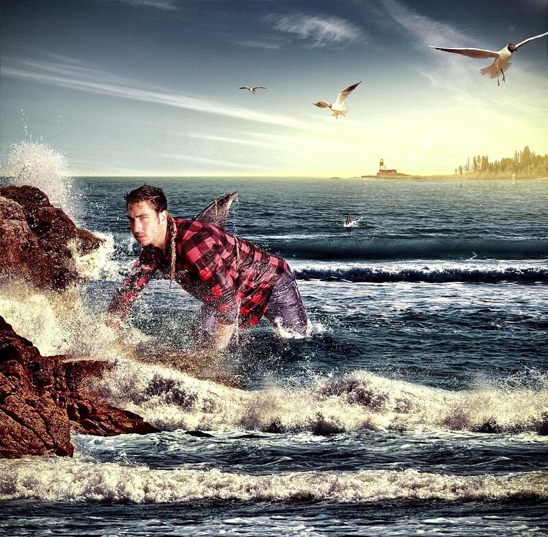 man in plaid shirt on rocky shore
