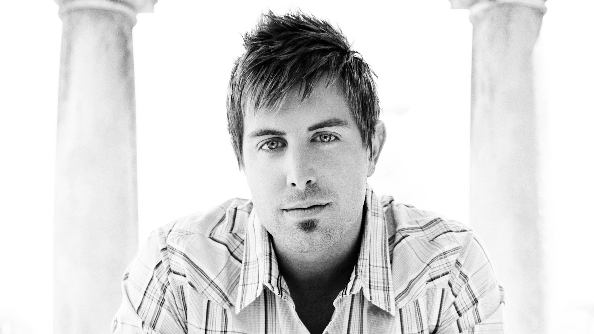 man in plaid shirt portrait