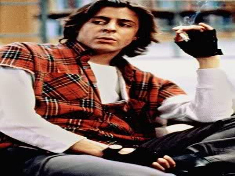 Man in Plaid Shirt — Red, Serious