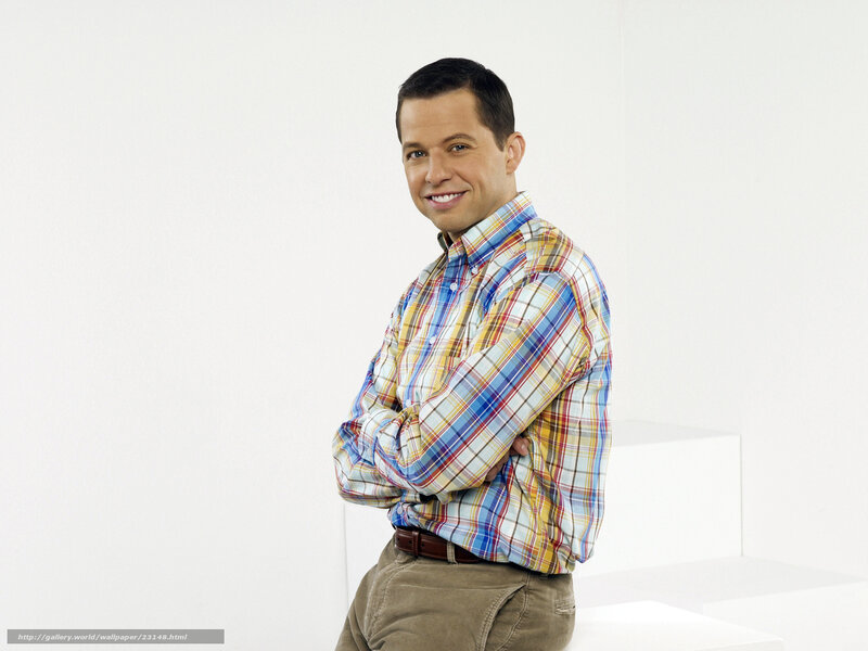man in plaid shirt smiling