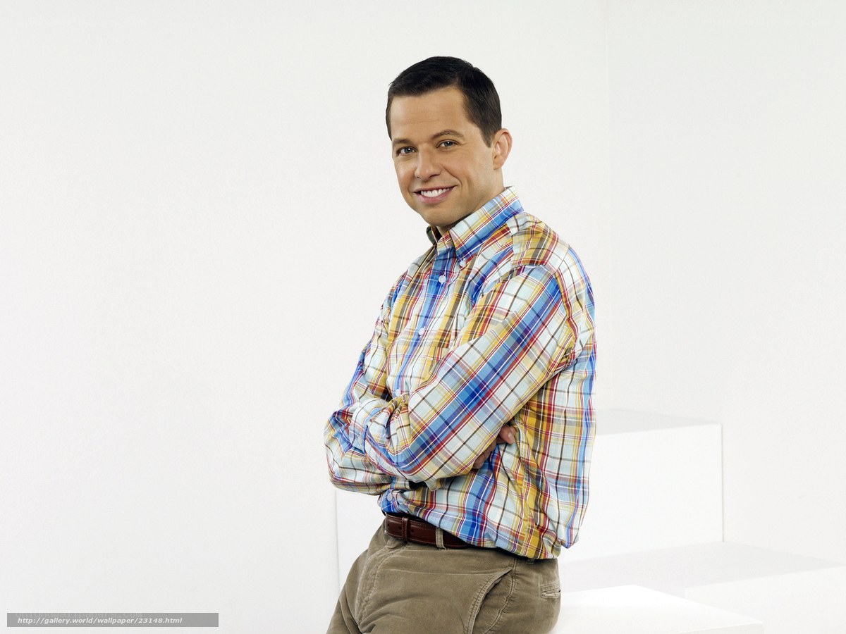 man in plaid shirt smiling