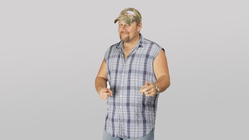 man in plaid sleeveless shirt