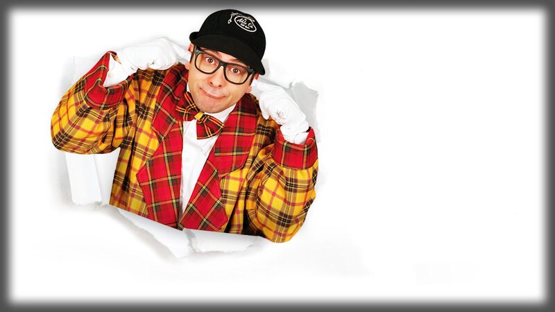 man in plaid suit peeking through hole