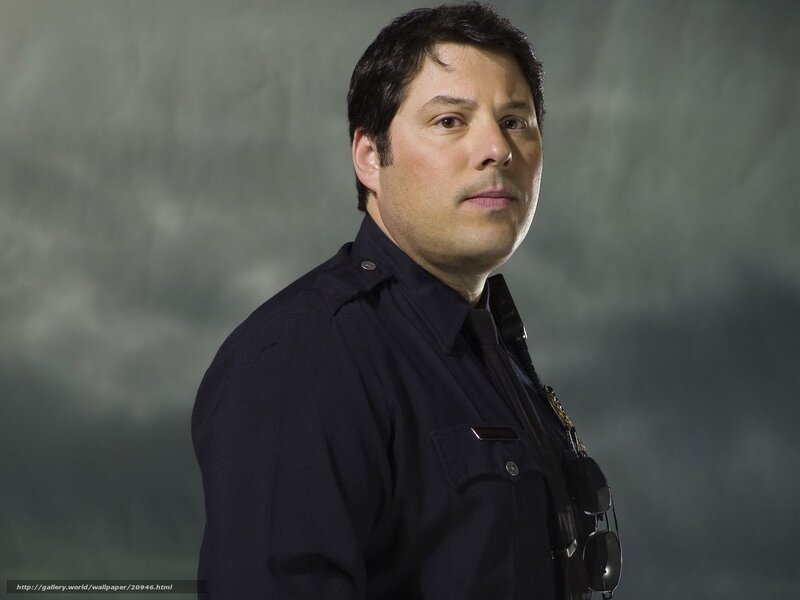 Man in Police Uniform — Black, Serious