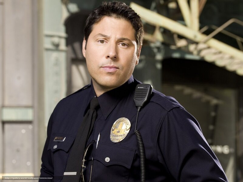 Man in Police Uniform — Blue, Serious