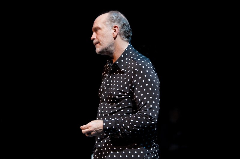 man in polka-dot shirt