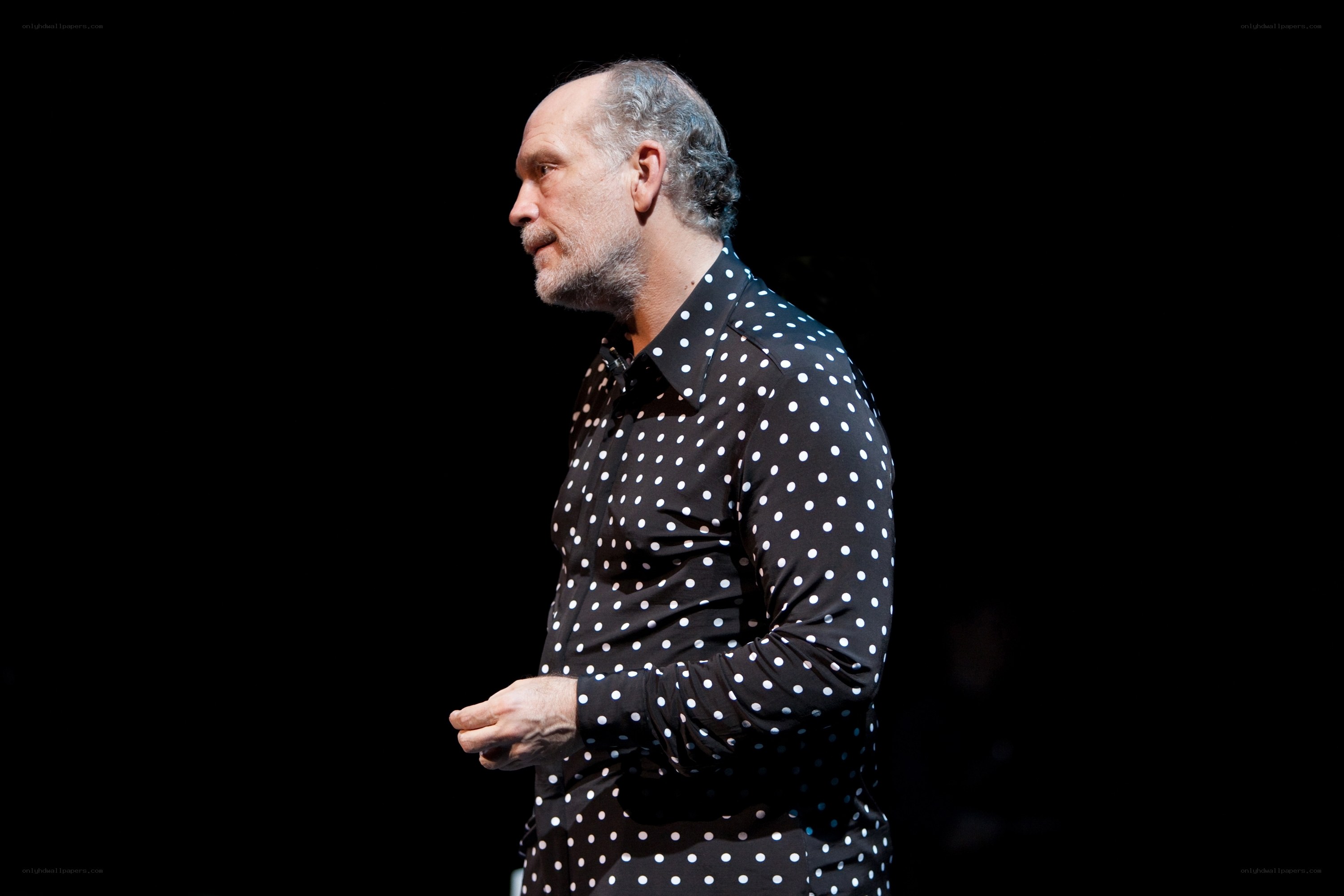 man in polka-dot shirt
