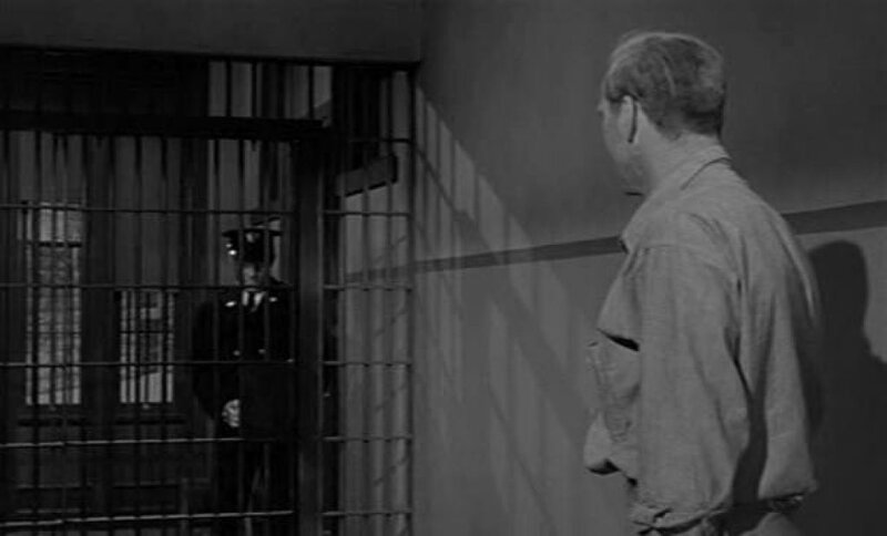 Man in Prison Cell — Black