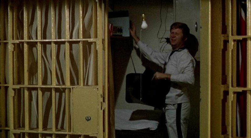 Man in Prison Cell — Yellow