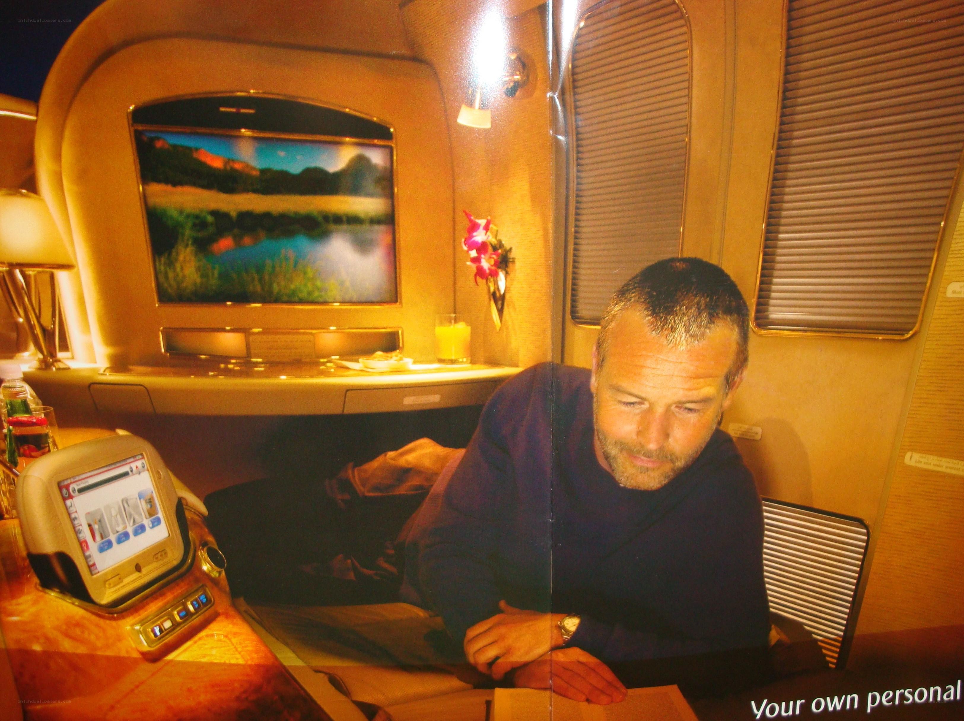 Man in private jet cabin