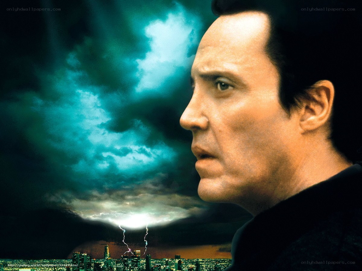 Man in profile against stormy city