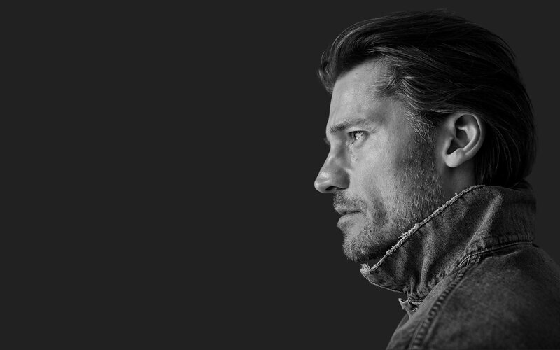 man in profile on dark background