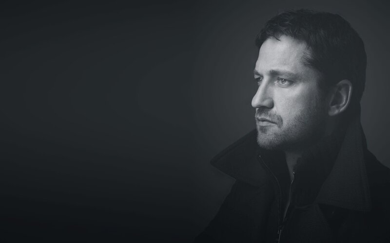 man in profile on dark background