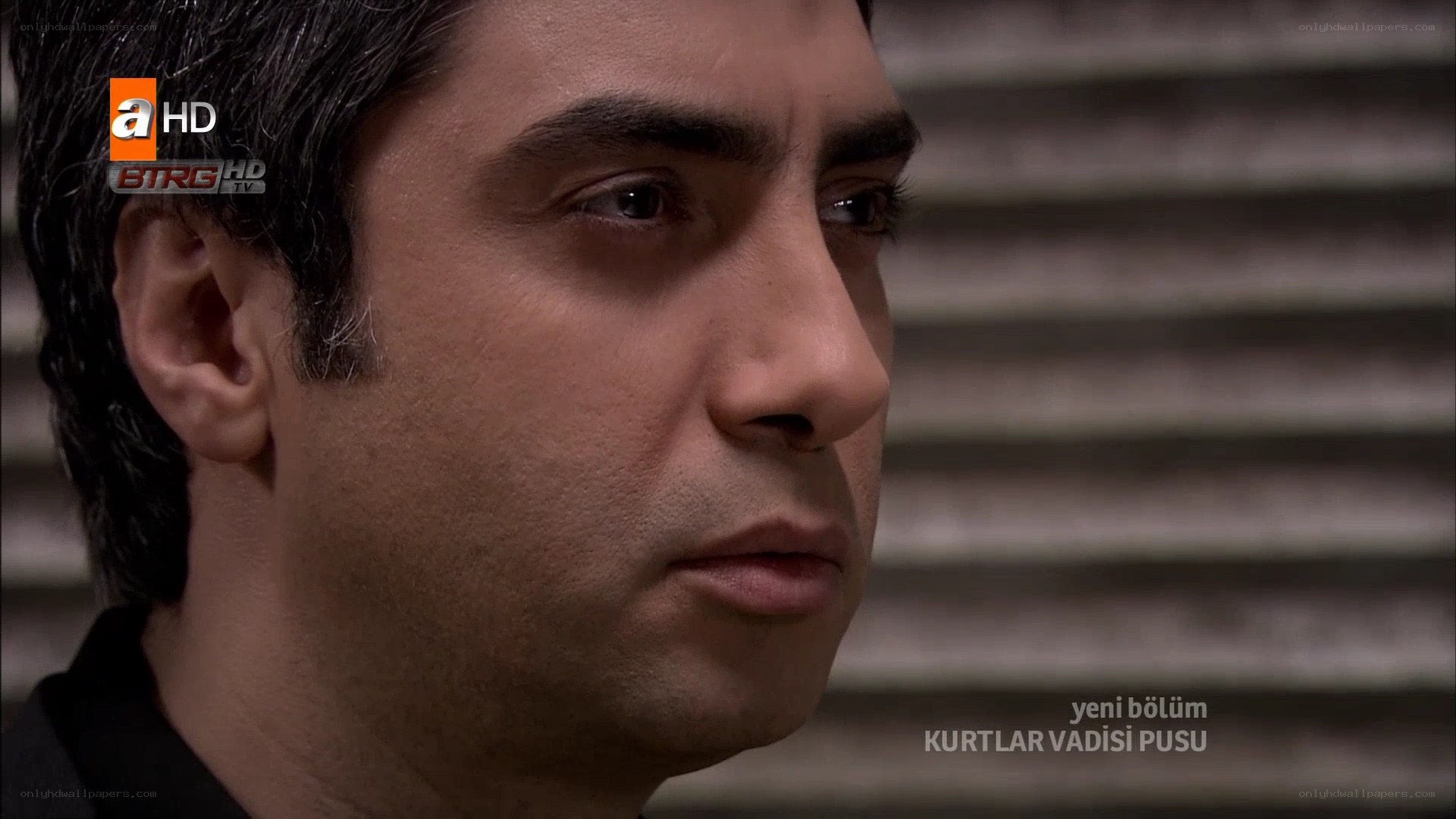 man in profile on tv show