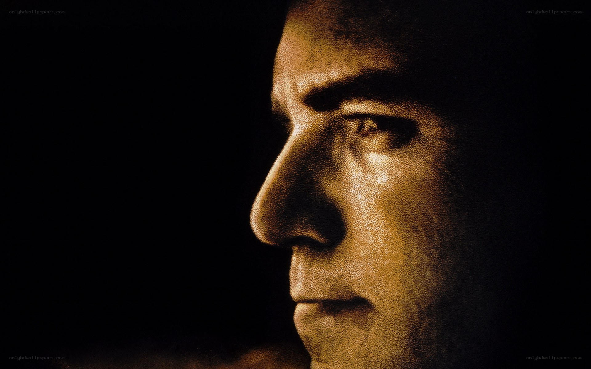 man in profile with golden light