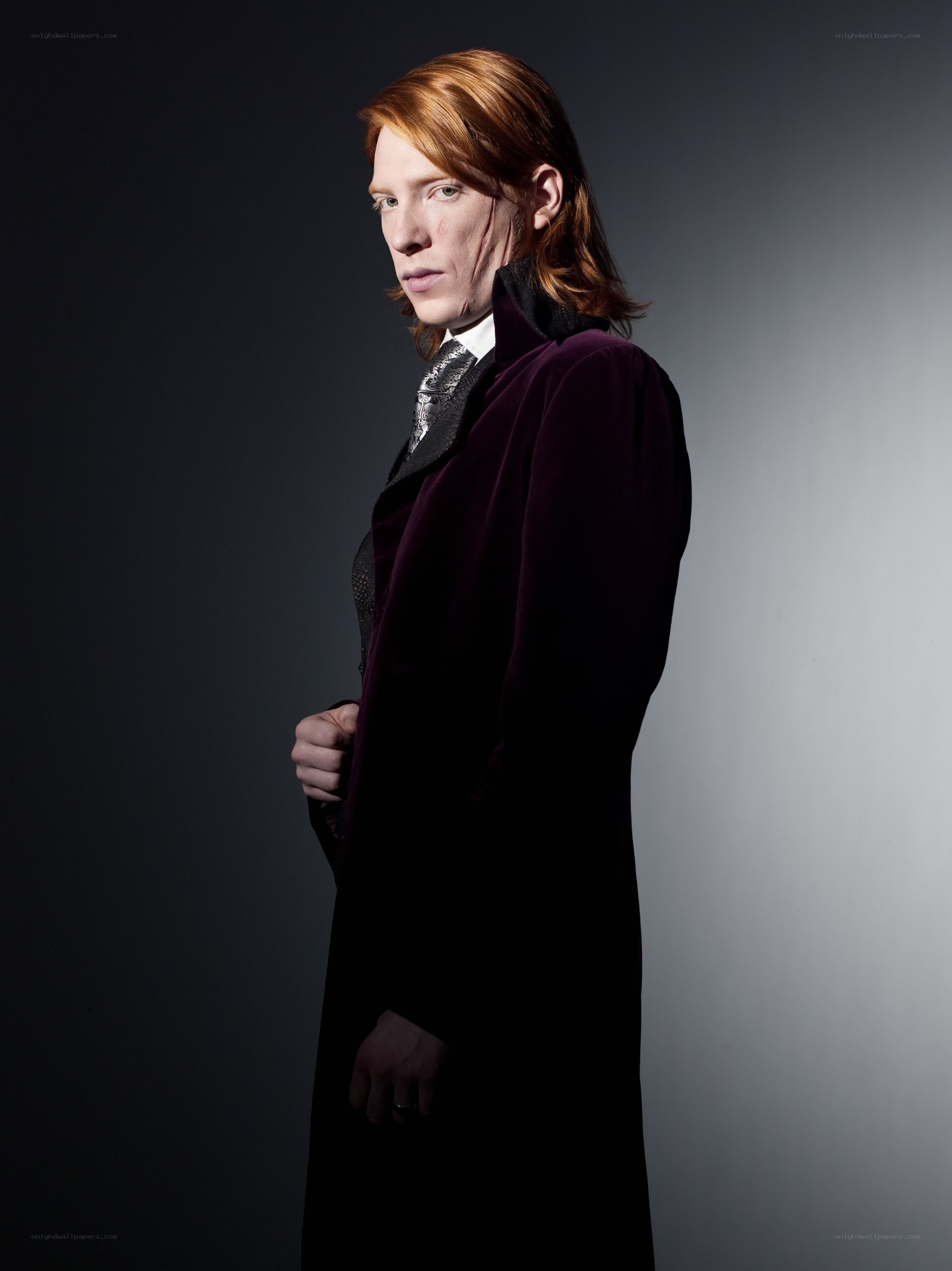 man in purple coat