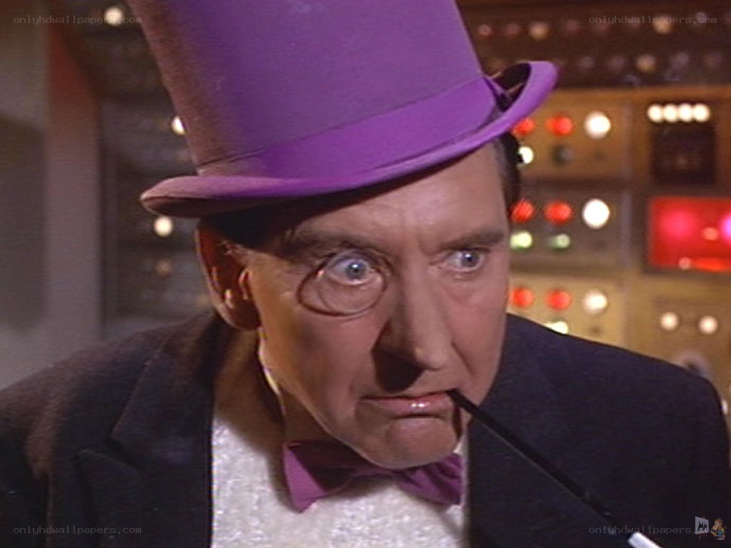 man in purple hat and bow tie